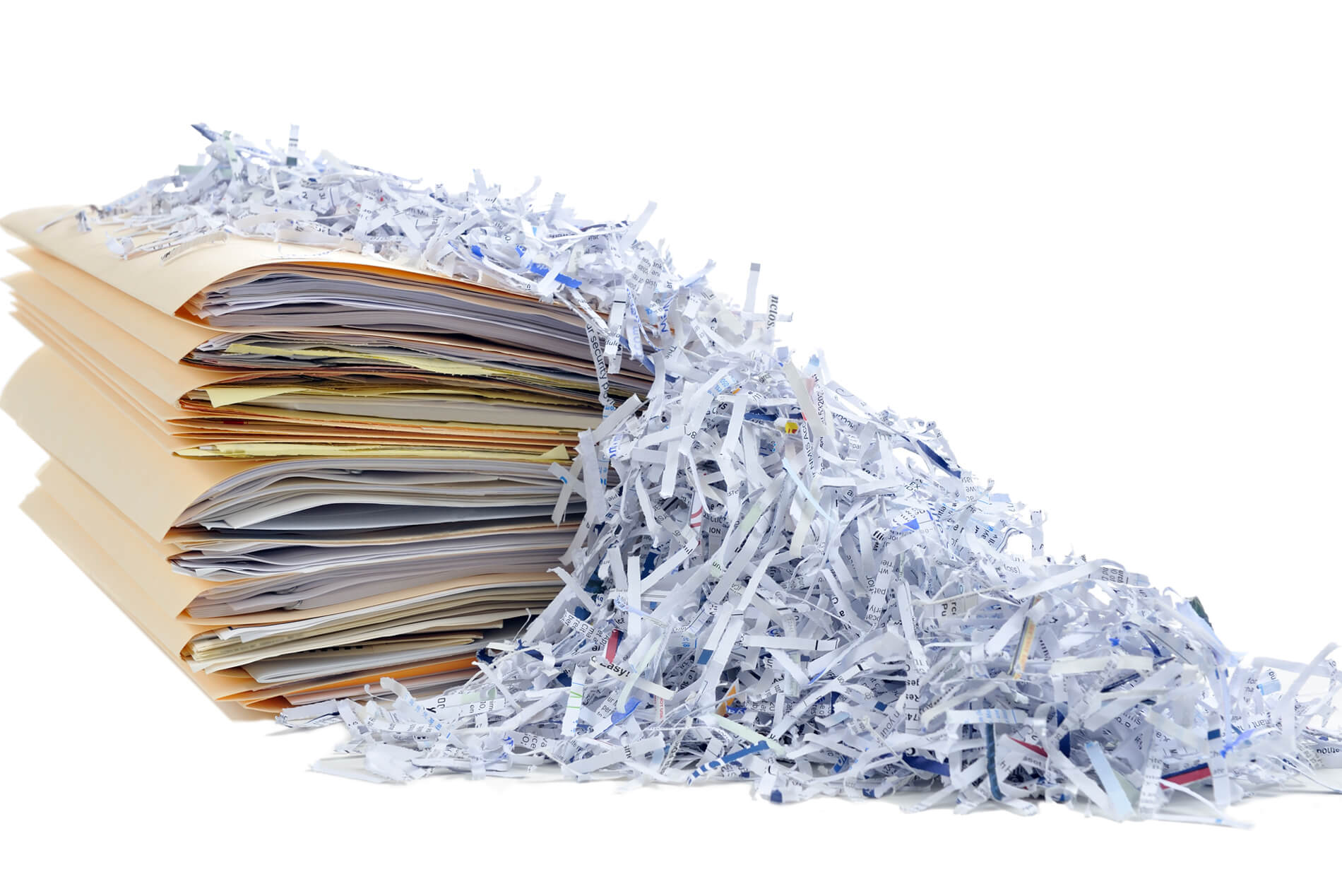 A pile of documents in manilla envelopes sits next to a pile of shredded paper.